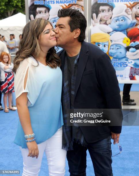 Actor George Lopez and daughter Mayan Lopez arrive at the Los Angeles premiere of "Smurfs 2" at Regency Village Theatre on July 28, 2013 in Westwood,...
