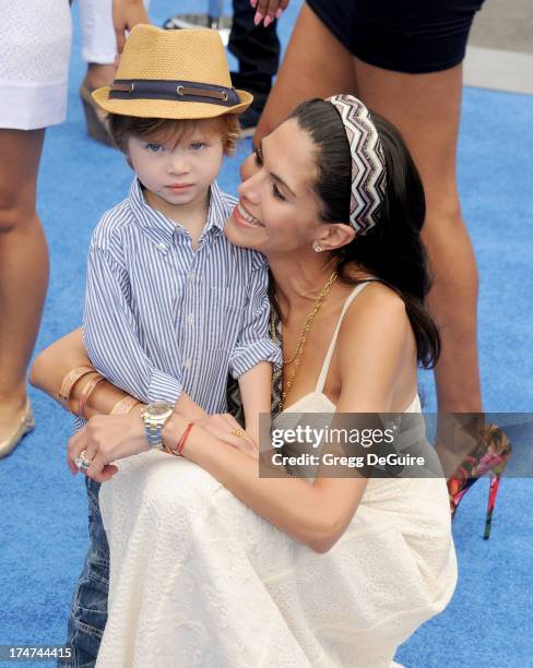 Actress Joyce Giraud and son Leonardo Ohoven arrive at the Los Angeles premiere of "Smurfs 2" at Regency Village Theatre on July 28, 2013 in...