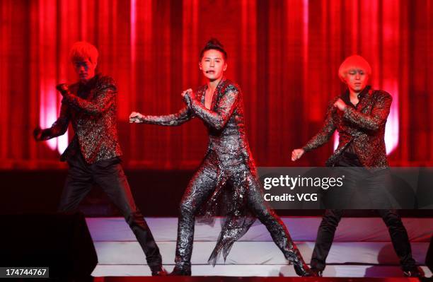 South Korean singer Kim Junsu of JYJ performs on the stage in concert at Mercedes Benz Arena on July 28, 2013 in Shanghai, China.