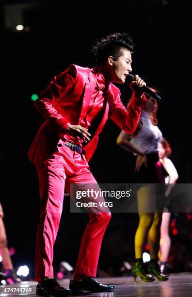 South Korean singer Kim Junsu of JYJ performs on the stage in concert at Mercedes Benz Arena on July 28, 2013 in Shanghai, China.