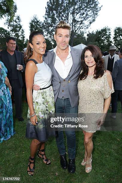 Eva LaRue, Chaz Dean and Joanne Dean attend the 15th Annual DesignCare benefiting The HollyRod Foundation on July 27, 2013 in Malibu, California.