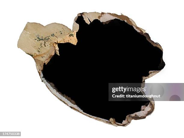 illustration of a jagged torn hole in a wall - break through stock pictures, royalty-free photos & images