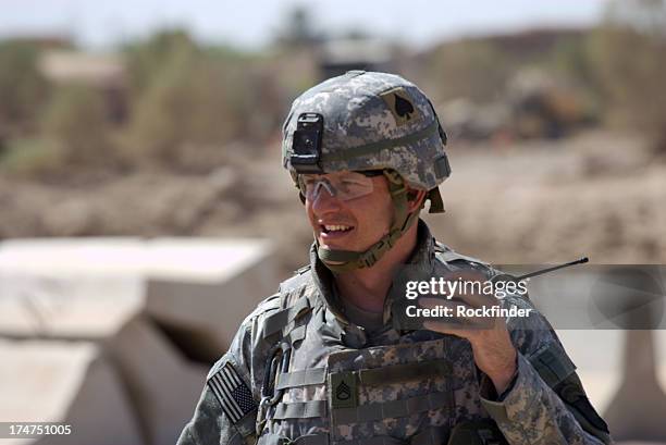 radio soldier - army soldier helmet stock pictures, royalty-free photos & images