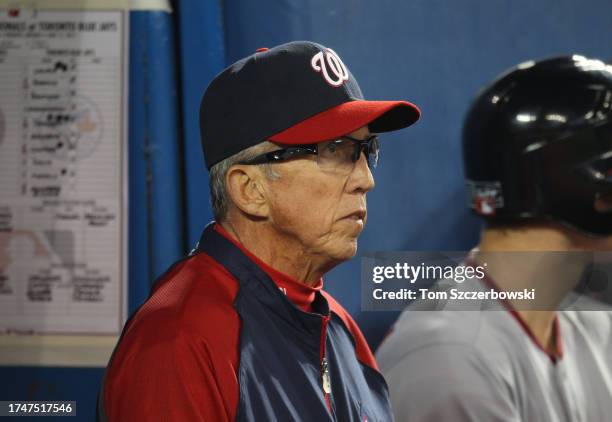 Manager Davey Johnson of the Washington Nationals looks on from the dugout during MLB game action against the Toronto Blue Jays at the Rogers Centre...