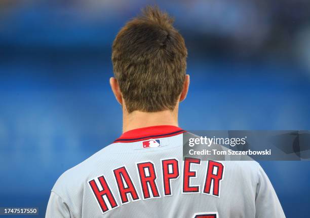 View of the back of the jersey of Bryce Harper of the Washington Nationals at the conclusion of the first inning during MLB game action against the...