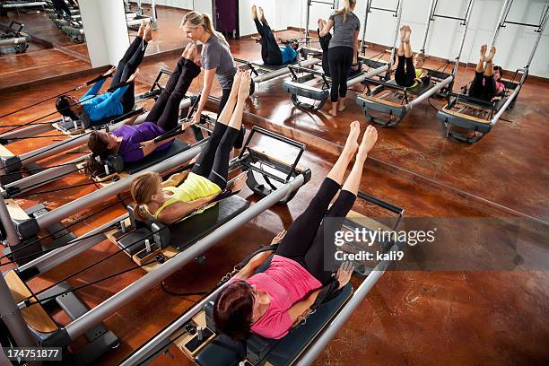 pilates class - pilates equipment stock pictures, royalty-free photos & images