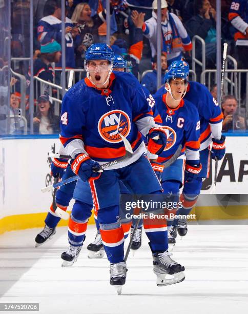 Bo Horvat of the New York Islanders celebrates his third period game tying goal against the New Jersey Devils at UBS Arena on October 20, 2023 in...