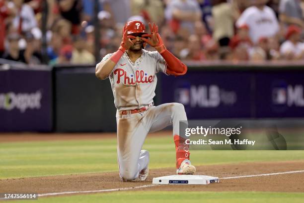 Johan Rojas of the Philadelphia Phillies celebrates his triple against the Arizona Diamondbacks in the seventh inning during Game Four of the...