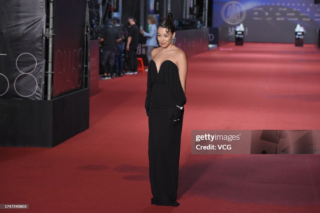 Singer Dominique Choy, aka Dizzy Dizzo, arrives at the red carpet of ...