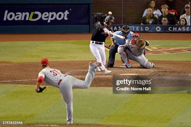 Alek Thomas of the Arizona Diamondbacks hits a two-run home run against the Philadelphia Phillies in the eighth inning during Game Four of the...