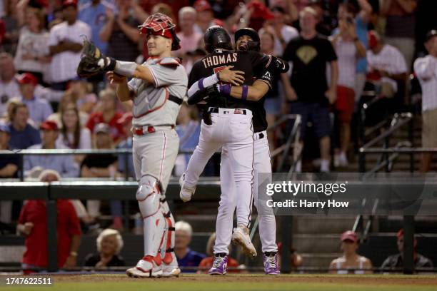 Alek Thomas of the Arizona Diamondbacks celebrates his two-run home run against the Philadelphia Phillies with Lourdes Gurriel Jr. #12 in the eighth...