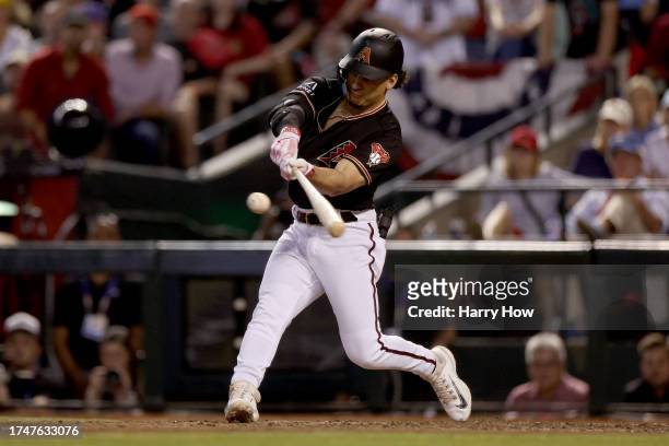 Alek Thomas of the Arizona Diamondbacks hits a two-run home run against the Philadelphia Phillies in the eighth inning during Game Four of the...