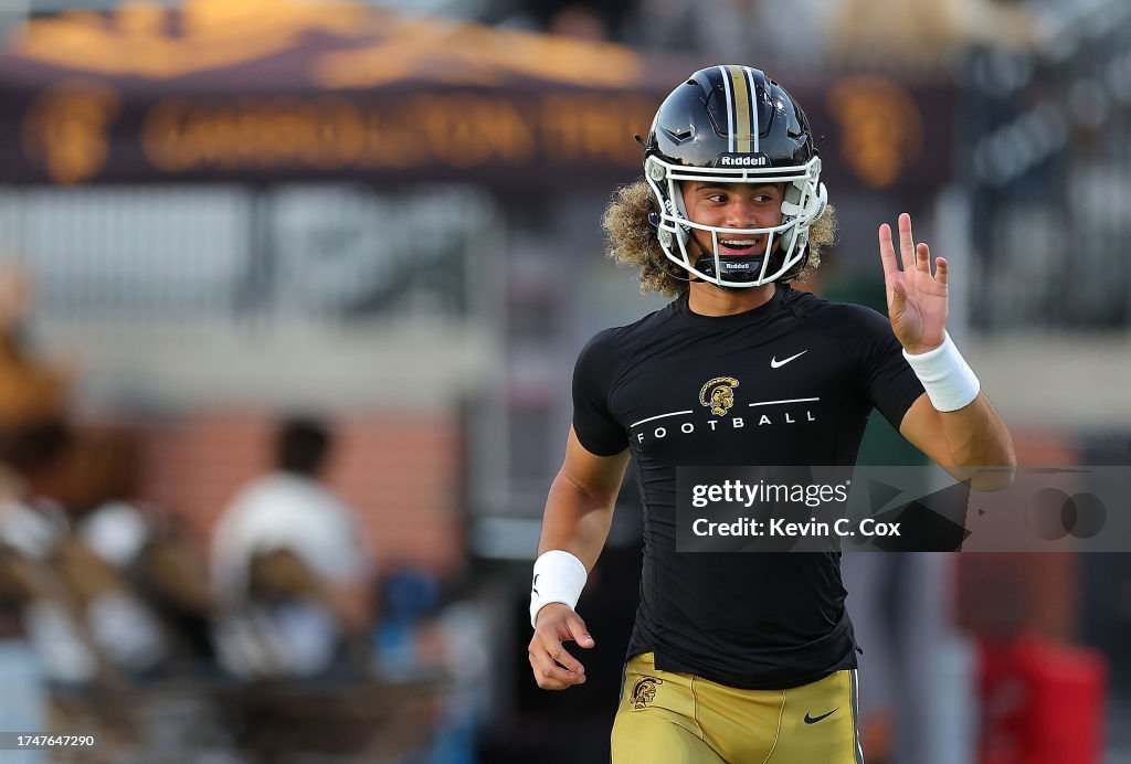 Julian "Ju Ju" Lewis of the Carrollton High School Trojans warms up