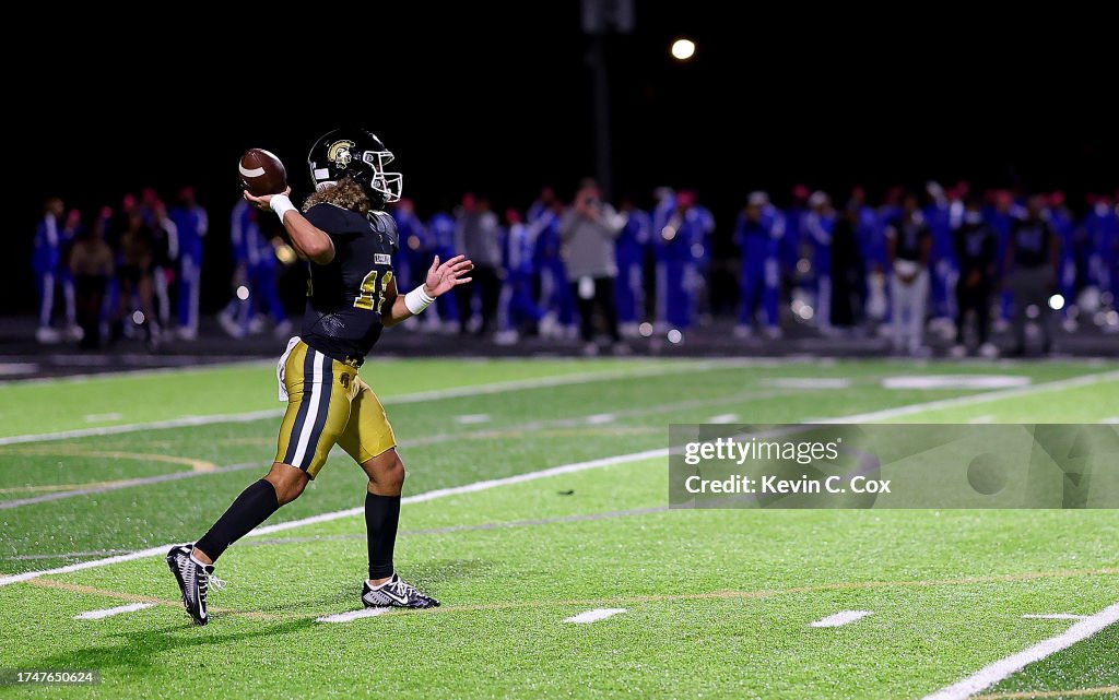 Julian "Ju Ju" Lewis of the Carrollton High School Trojans looks to