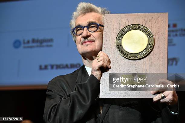 Wim Wenders poses with the "Prix Lumiere" during the Lumiere Award Ceremony during the 15th Film Festival Lumiere on October 20, 2023 in Lyon, France.