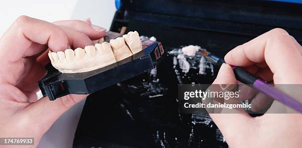 manufacturing of ceramic crown - dental crown stock pictures, royalty-free photos & images