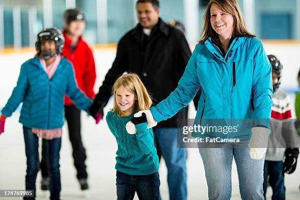 ice skating - family ice skate stock pictures, royalty-free photos & images