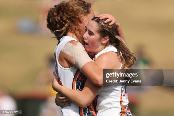 Giants celebrate the goal of Zarlie Goldsworthy of the Giants during the round eight AFLW match between Greater Western Sydney Giants and Carlton...