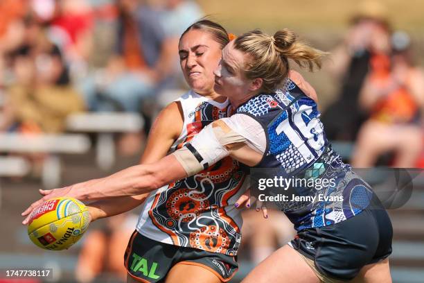 Brodee Mowbray of the Giants and Breann Moody of the Blues compete for the ball during the round eight AFLW match between Greater Western Sydney...