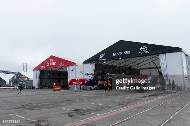 Emirates Team New Zealand base early in the morning launching their race boat and placing the wing on the boat. The Louis Vuitton Cup sailed in AC...