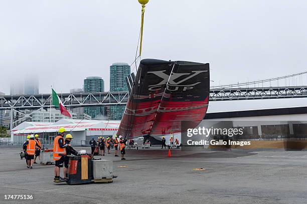 Emirates Team New Zealand base early in the morning launching their race boat and placing the wing on the boat. The Louis Vuitton Cup sailed in AC...