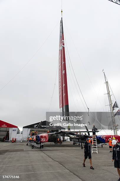 Emirates Team New Zealand base early in the morning launching their race boat and placing the wing on the boat. The Louis Vuitton Cup sailed in AC...