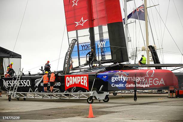 Emirates Team New Zealand base early in the morning launching their race boat and placing the wing on the boat. The Louis Vuitton Cup sailed in AC...