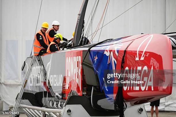 Emirates Team New Zealand base early in the morning launching their race boat and placing the wing on the boat. The Louis Vuitton Cup sailed in AC...