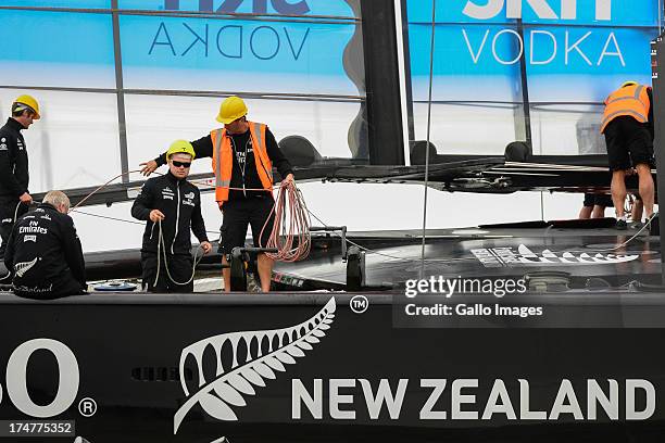Emirates Team New Zealand base early in the morning launching their race boat and placing the wing on the boat. The Louis Vuitton Cup sailed in AC...