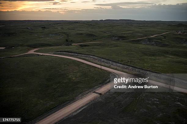 The North Dakota landscape extends in site from the top of Raven Drilling's oil rig on July 28, 2013 outside Watford City, North Dakota. North Dakota...