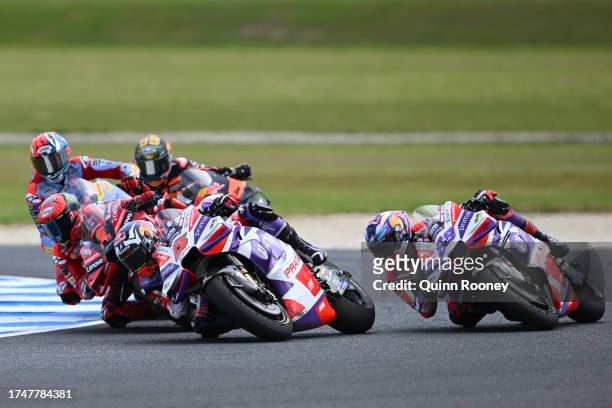Johann Zarco of France and the Prima Pramac Racing Team overtakes the lead from Jorge Martin of Spain and the Prima Pramac Racing Team during the...