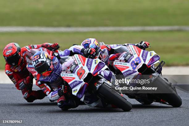 Johann Zarco of France and the Prima Pramac Racing Team overtakes the lead from Jorge Martin of Spain and the Prima Pramac Racing Team during the...