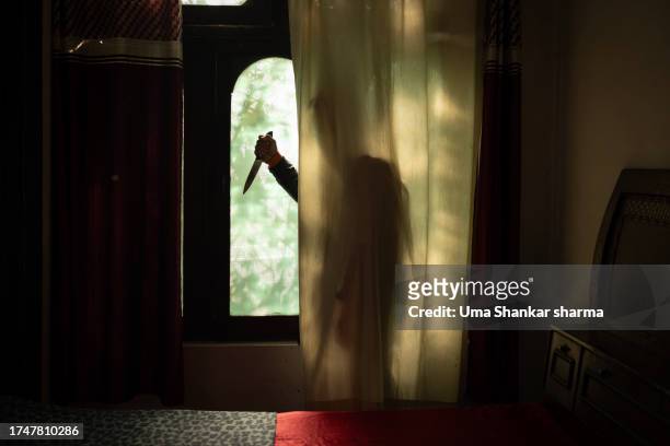killer hiding behind the curtains. - murder victim stock pictures, royalty-free photos & images