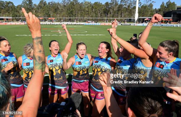 The Lions players celebrate victory after the round eight AFLW match between Brisbane Lions and Adelaide Crows at Brighton Homes Arena, on October 21...
