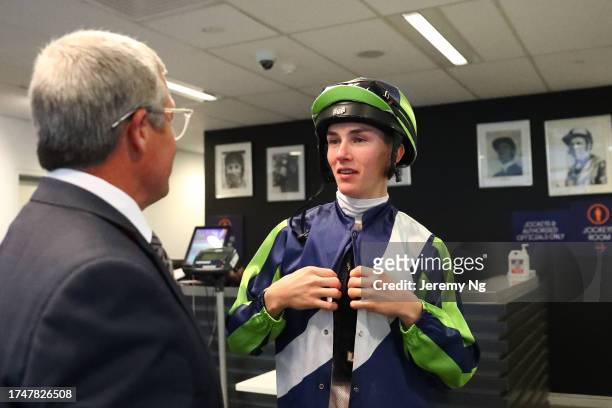 Zac Lloyd and mentor and former jockey Darren Beadman speak to each other during the Spring Wild Card Day - Sydney Racing at Royal Randwick...