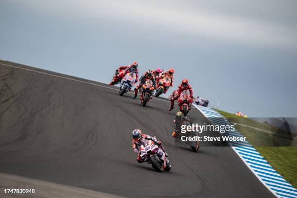 Jorge Martin of Spain and Prima Pramac Racing leads the race in front of Brad Binder of South Africa and Red Bull KTM Factory Racing and Francesco...