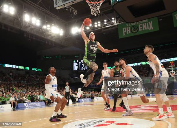 Mitchell Creek of the Phoenix dunks during the round four NBL match between South East Melbourne Phoenix and Brisbane Bullets at John Cain Arena, on...