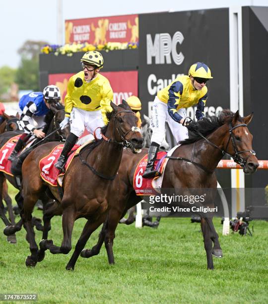Mark Zahra riding Without A Fight defeats Jamie Spencer riding West Wind Blows in Race 9, the Carlton Draught Caulfield Cup, during Melbourne Racing...