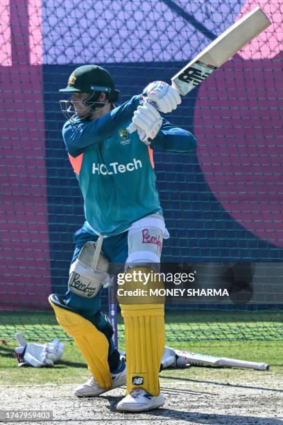 Australia's Steve Smith bats in the nets during a practice session on the eve of their 2023 ICC Men's Cricket World Cup one-day international match...