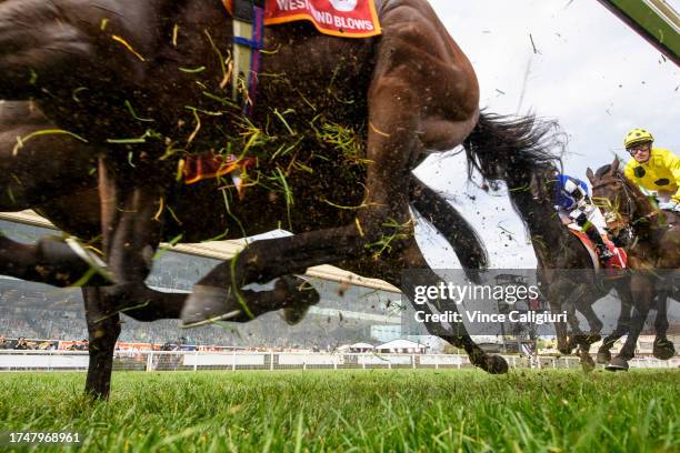 Mark Zahra riding Without A Fight approaching the first turn before winning Race 9, the Carlton Draught Caulfield Cup, during Melbourne Racing at...