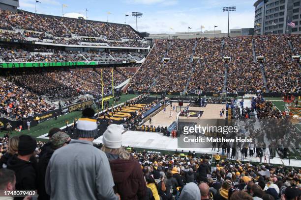 Fans attend the Crossover at Kinnick Event to watch the exhibition match-up between the Iowa Hawkeyes and the DePaul Blue Demons at Kinnick Stadium...