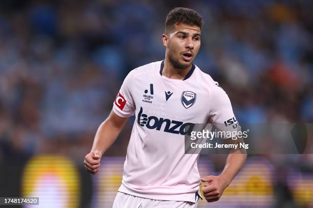 Zinedine Machach of the Victory celebrates scoring a goal during the A-League Men round one match between Sydney FC and Melbourne Victory at Allianz...