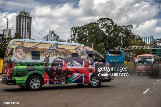 Van set to be part of the royals' convoy and decorated by Kenyan artists with symbolic designs representing the UK and Kenya is seen parked at a bus...