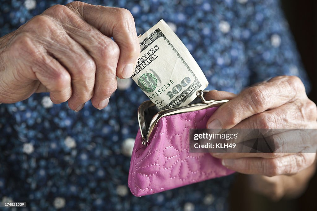 Cash and Elderly Hands
