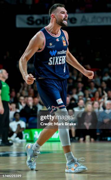 Issac Humphries of the 36ers celebrates a basket during the round four NBL match between Adelaide 36ers and Perth Wildcats at Adelaide Entertainment...
