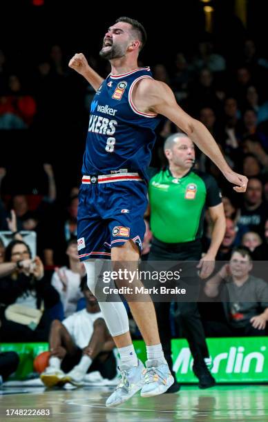 Issac Humphries of the 36ers celebrates a basket during the round four NBL match between Adelaide 36ers and Perth Wildcats at Adelaide Entertainment...