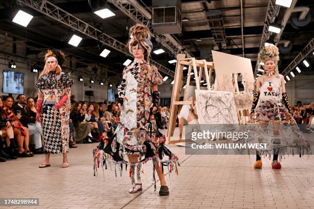 Models parade outfits by student designer Jedda Bahloo in the Student Collections Runway during the Melbourne Fashion Week, in Melbourne on October...