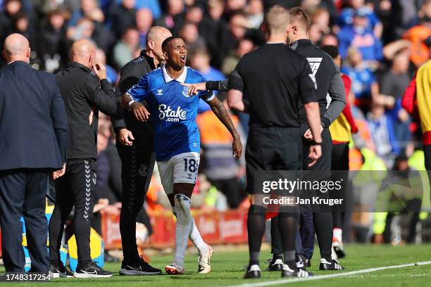 Ashley Young of Everton reacts as he is sent off after being shown a red card during the Premier League match between Liverpool FC and Everton FC at...