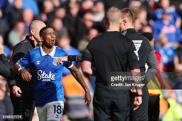Ashley Young of Everton reacts as he is sent off after being shown a red card during the Premier League match between Liverpool FC and Everton FC at...