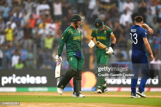 Heinrich Klaasen of South Africa celebrates their century during the ICC Men's Cricket World Cup India 2023 match between England and South Africa at...